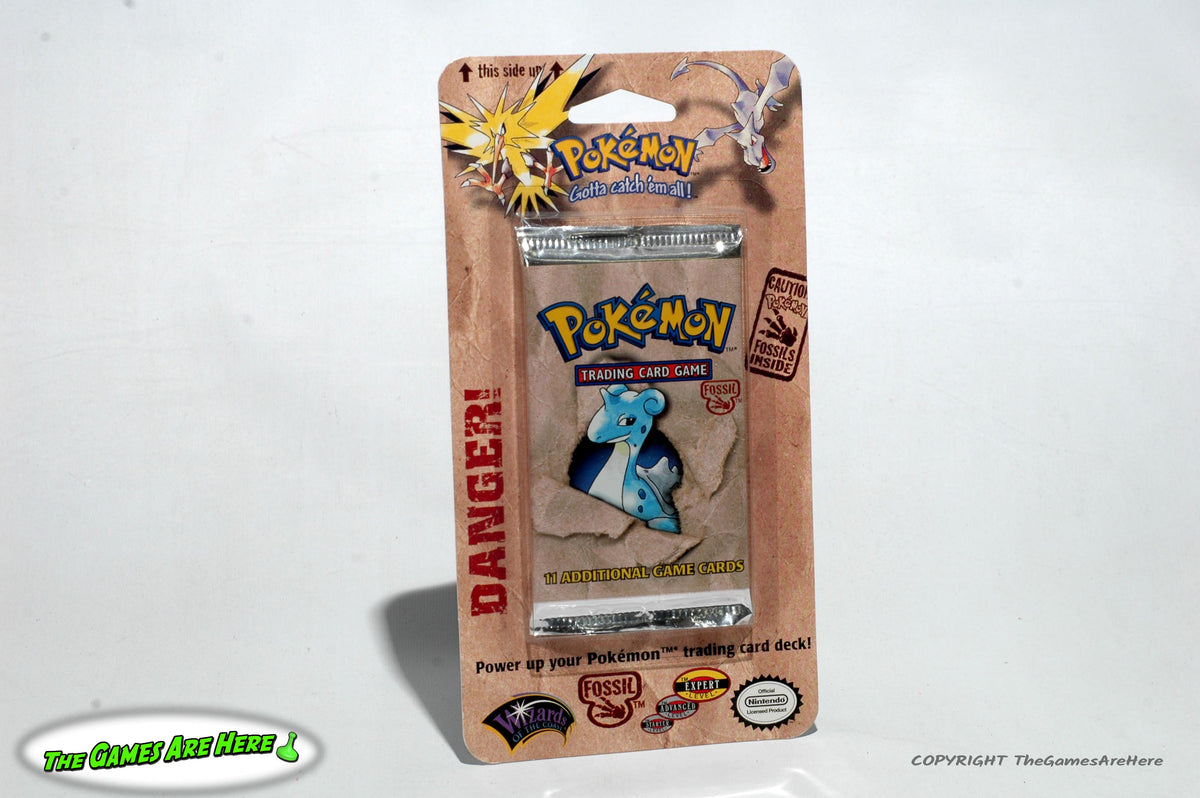 Pokemon Trading Card Game Fossil Booster Pack on Card w Lapras Art - W The Games Are Here Pokemon Trading Card Game Fossil Booster Pack on Card w Lapras Art - W The Games Are Here