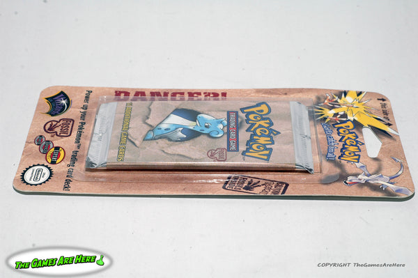 Pokemon Trading Card Game Fossil Booster Pack on Card w Lapras Art - W The Games Are Here Pokemon Trading Card Game Fossil Booster Pack on Card w Lapras Art - W The Games Are Here